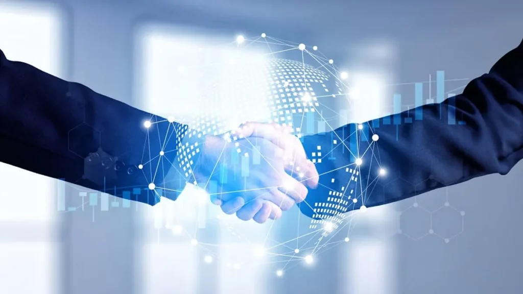 Zwei Menschen in Geschäftsanzügen geben sich die Hand. Ein digitales, leuchtendes Netzwerk und eine Globus-Überlagerung symbolisieren globales Geschäft, Partnerschaft oder technologiebasierte Zusammenarbeit.