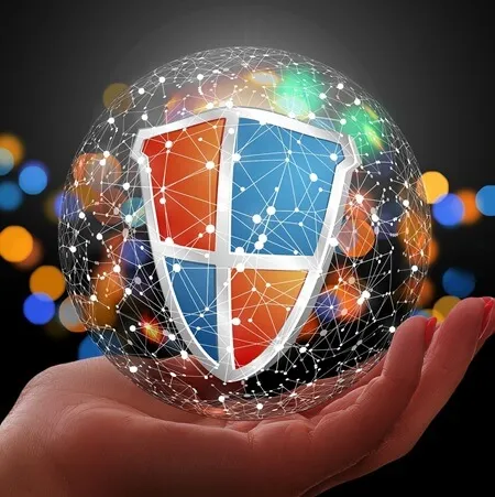 A hand holds a transparent sphere with a digital network pattern, containing a blue and orange shield symbol—representing secure Online SMS—against a backdrop of colorful, blurred lights.